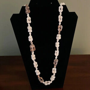 Small Seas Shell 50 Inch Necklace  white & tan colored